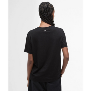 Paidan selkäpuolella on pieni metallinen logolaatta.