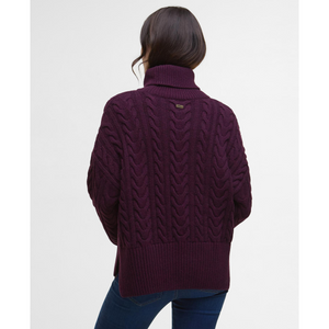 Neuleen niskaan on ommeltu pieni metallinen Barbour -logomerkki.