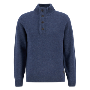 Merinovillaneuleessa on korkea kaulus jossa on vetoketjukiinnitys sekä koristenapitus.