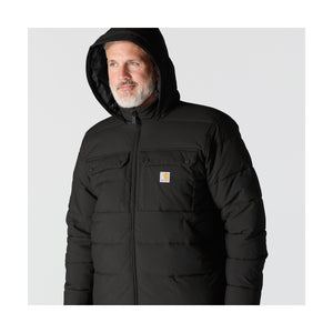 Takissa on huppu säätönyörillä, mock neck -kaulus sekä kokopitkä vetoketju leukasuojalla.