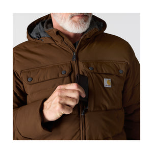 Takissa on paljon käytännöllisiä taskuja joista osa suljetaan neppareilla ja osa vetoketjulla.