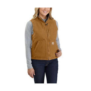 Kuvassa naisen päällä on Carhartt Sandstone canvasliivi jota voi käyttää esim. hupparin päällä.