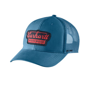 Kuvassa on sininen Carhartt Script Patch Cap trucker -mallinen lippis jossa on verkkomainen takaosa ja edessä näyttävä Carhartt Workwear -brodeeraus.