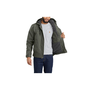 Lähikuva vihreän Carhartt Bartlett takin vuorikankaasta.