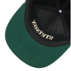 Stetson Baseball Cap American Heritage -lippiksen sisäosa, mustat saumanauhat ja hikinauha sekä vihreä lipan alapuoli.