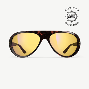 Kuvassa Vallon Moto Aviators Royal Enfield aurinkolasit joissa on keltaiset linssit ja kilpikonnakuvioiset kehykset.