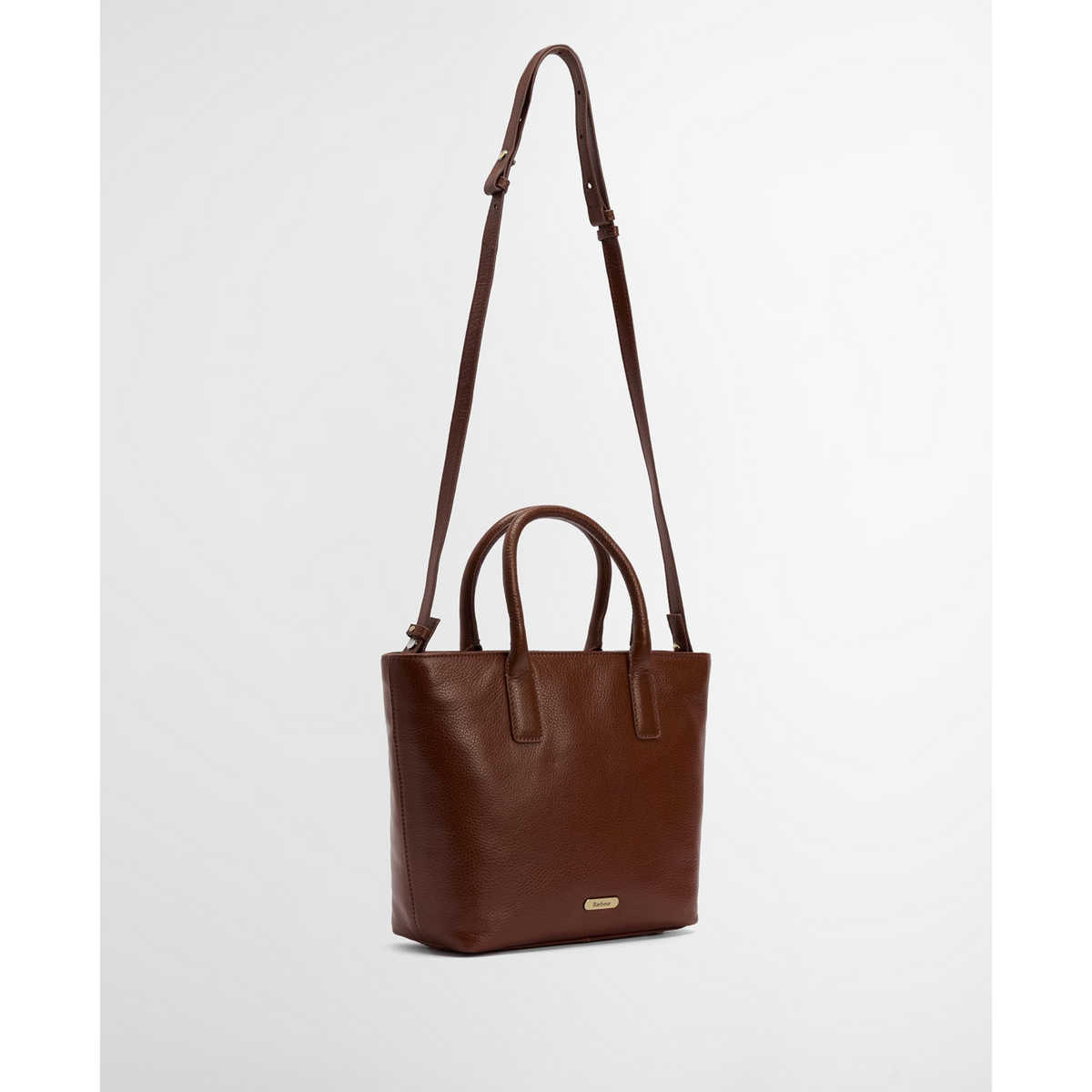 Irrotettava olkahihna mahdollistaa laukun kantamisen olalla tai crossbody -tyyliin.