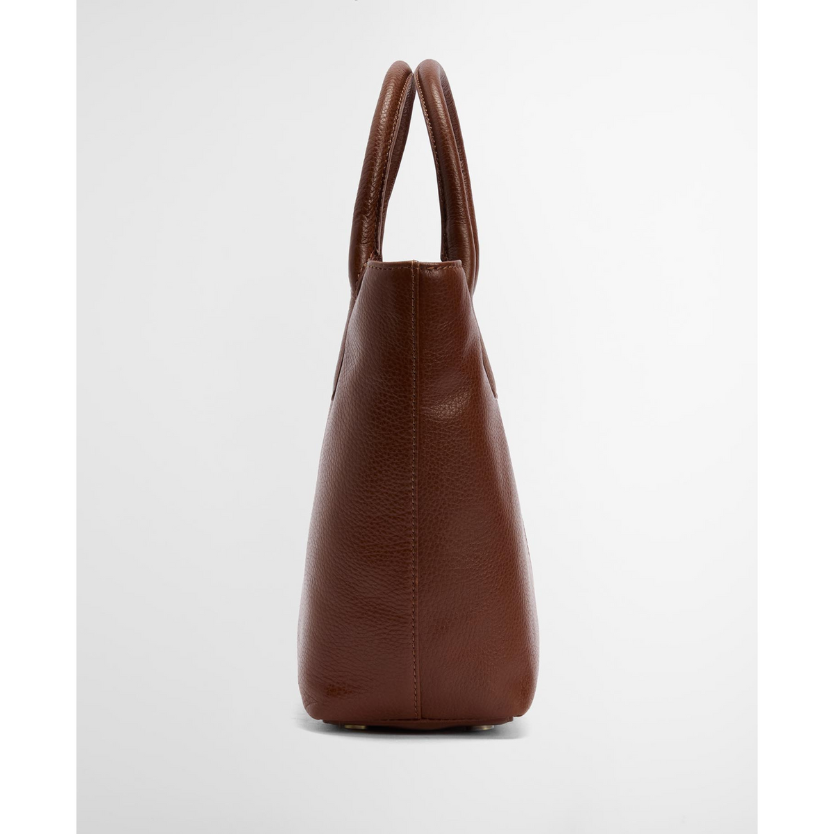 Laukussa on kaksoiskahvat sekä irrotettava olkahihna.