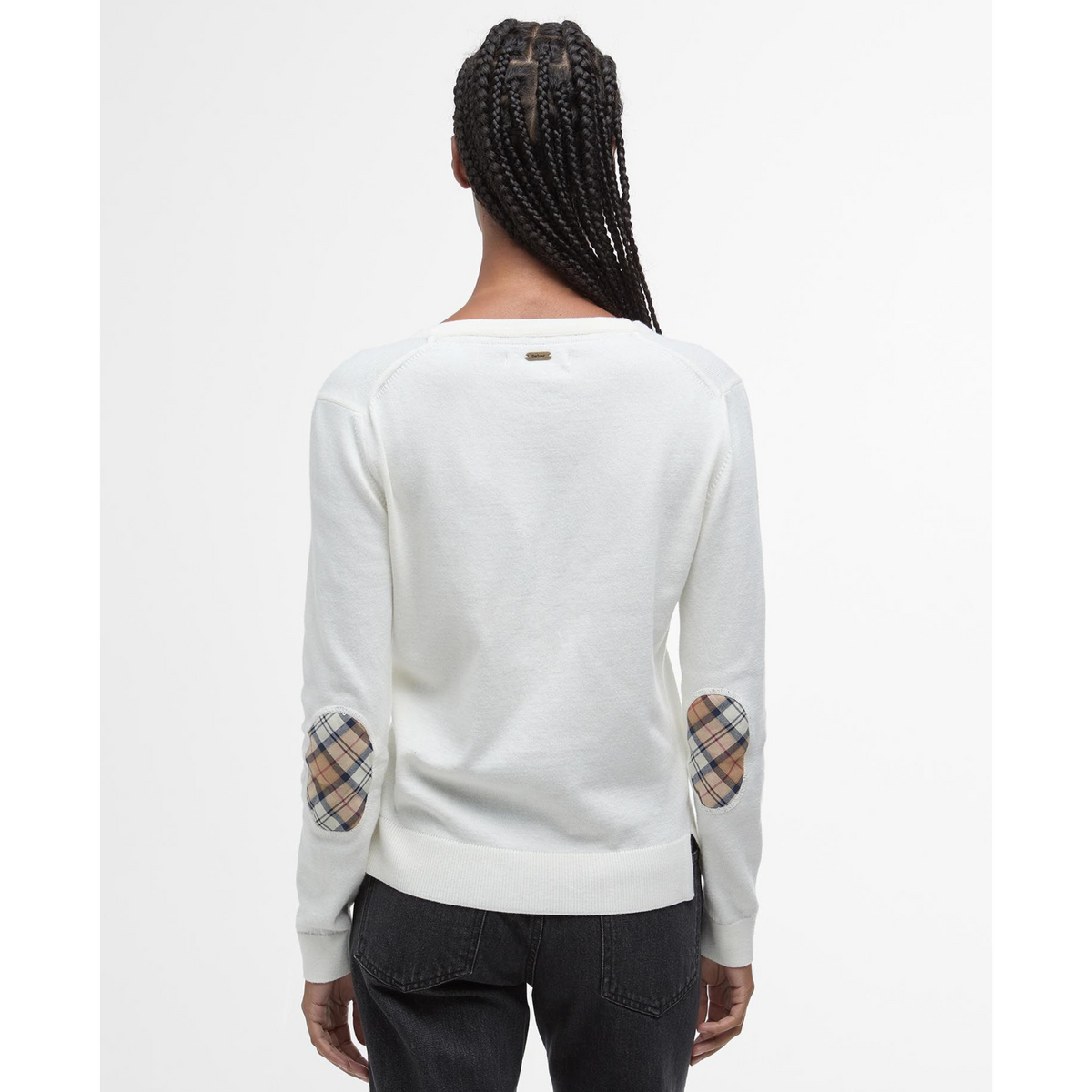 Neuletakin niskassa on pieni metallinen Barbout -logolaatta.