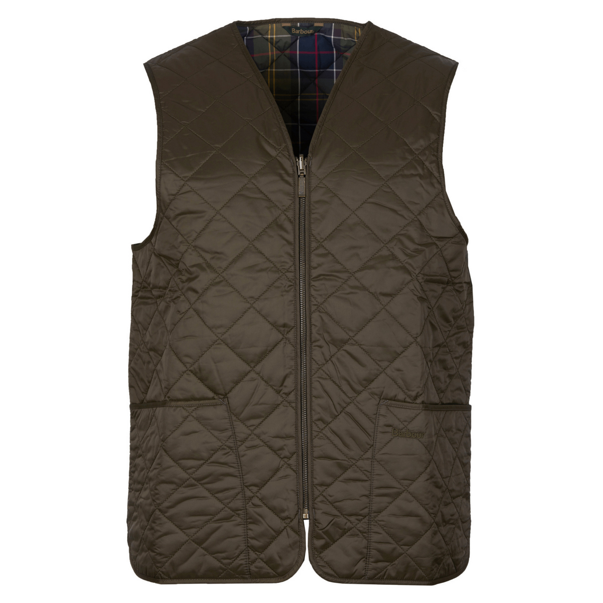 Kuvassa on Barbour Eaves -liivi jota voi käyttää sellaisenaan esim. neulepaidan kanssa tai kiinnittää vuoriliiviksi Barbourin öljykangastakkiin.