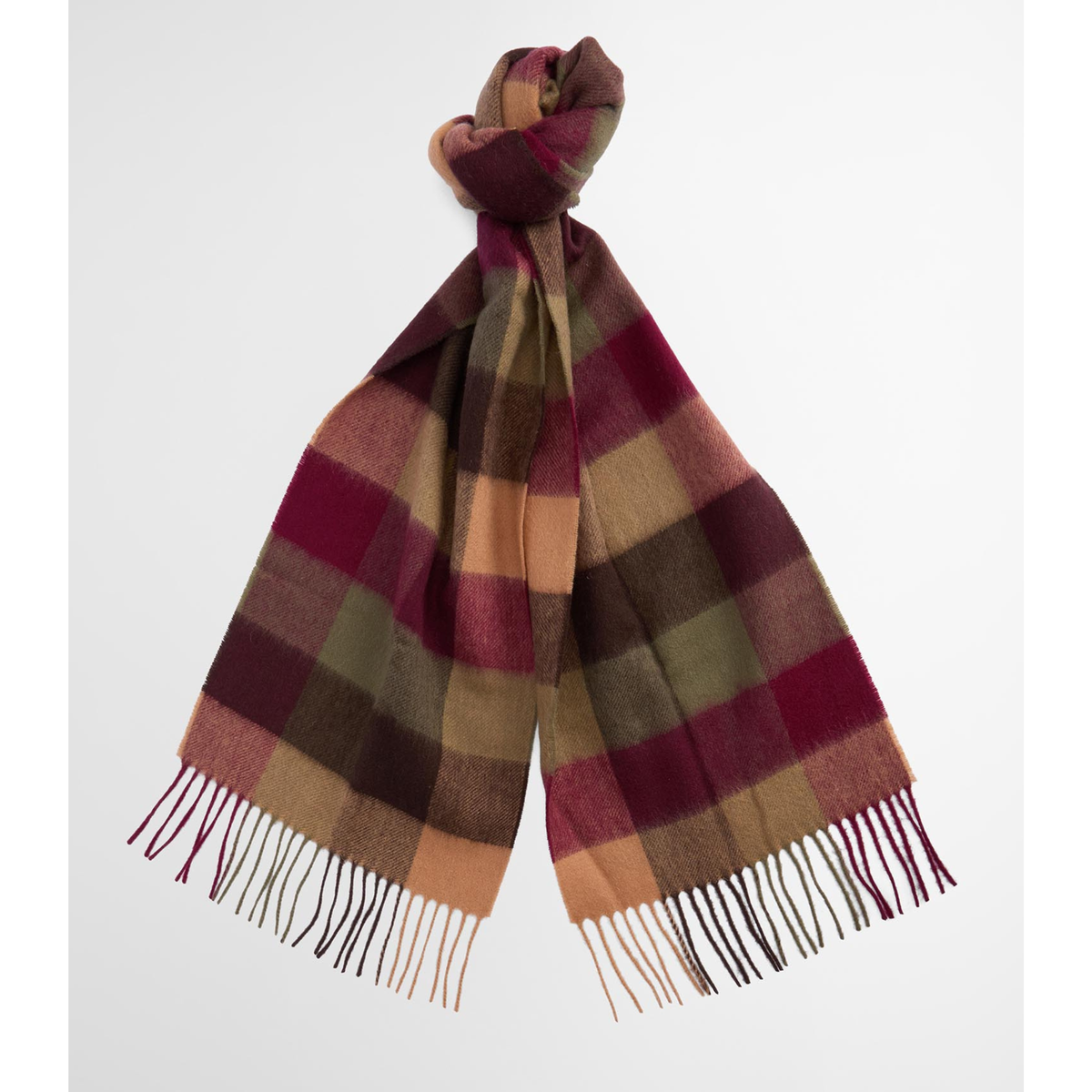 Kuvassa on klassinen Tattersall -ruutukuvioinen villainen kaulahuivi punaisen ja beigen eri sävyissä.