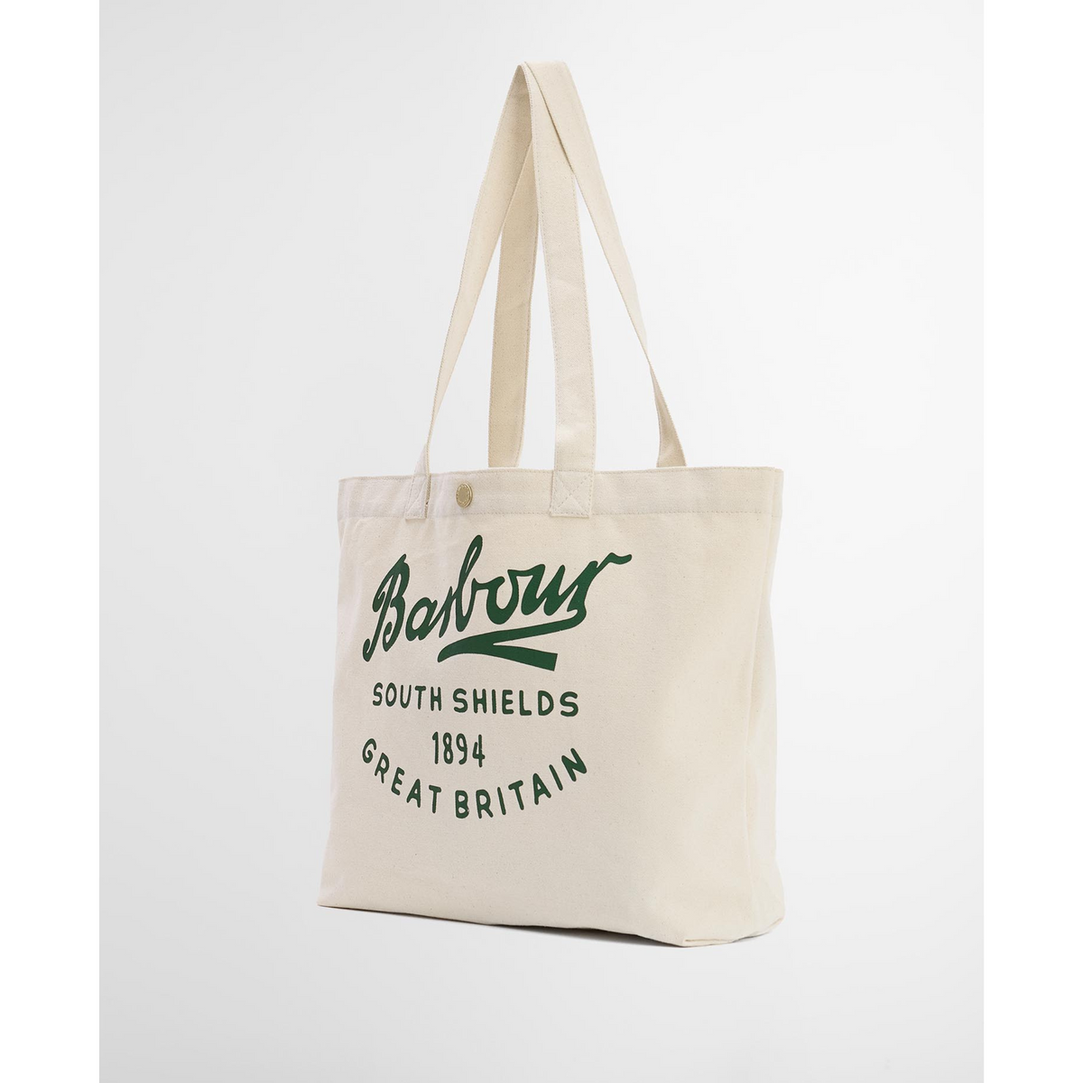 Kuvassa on barbourin luonnonvalkoinen kangaskassi jossa on vihreä, yliopistohenkinen Barbour -logo.