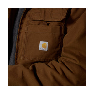 Vasempaan rintataskuun on ommeltu kankainen Carhartt logomerkki.