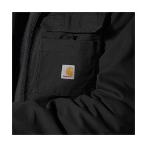 Rinnassa on kaksi erillistä tarroilla suljettavaa taskua.