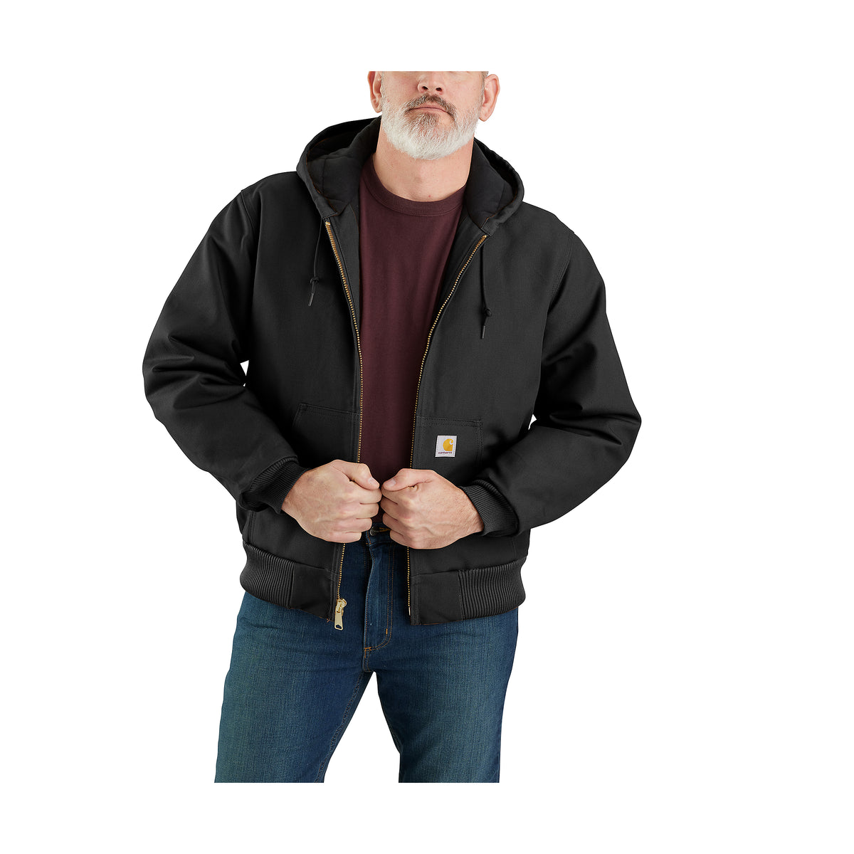 Miehellä on päällä Carhartt Icon J140 Active Jacket takki jossa on huppu. 