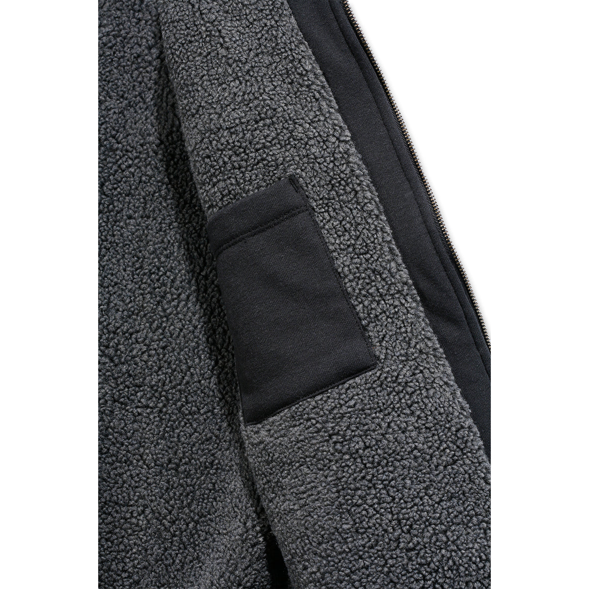 Lähikuvassa Carhartt Midweight Lined Sweatshirt hupparin sisällä oleva lämmin karvavuori. 