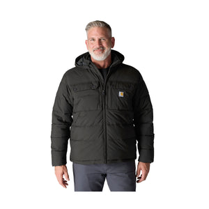 Kuvassa miehen päällä on musta Carhartt Montana Loose Fit Insulated toppatakki.