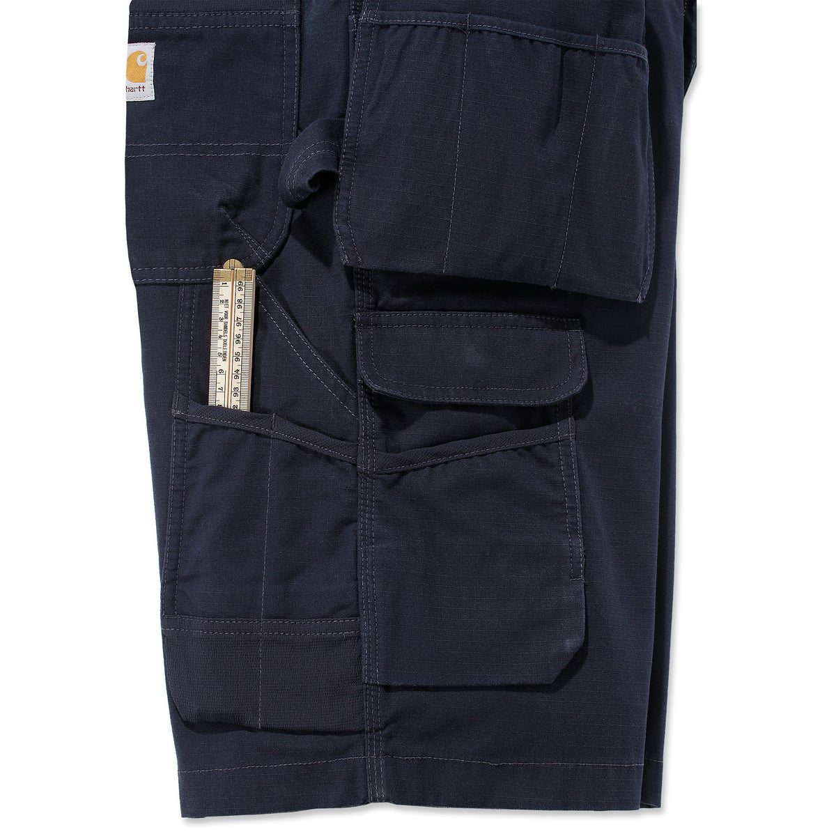 Kuvassa Carhartt Steel Multipocket Shortsit jossa on vasaralenkki ja useita taskuja. 