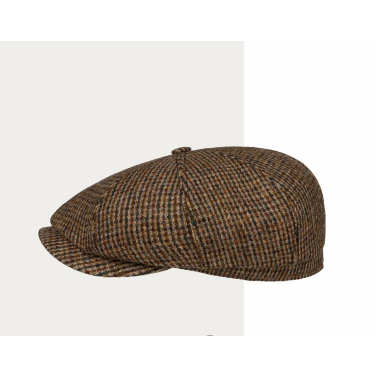 Miniruutukuosisessa Harris Tweed -kankaassa on ruskean, sinisen ja vihertävän eri sävyjä.