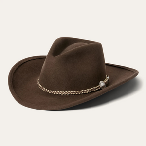 Stetson Rawhide 3x Buffalo hattu, jossa hatun punottua nauhaa koristaa aito buffalo-nikkelikoriste, joka viimeistelee rouhean ilmeen.