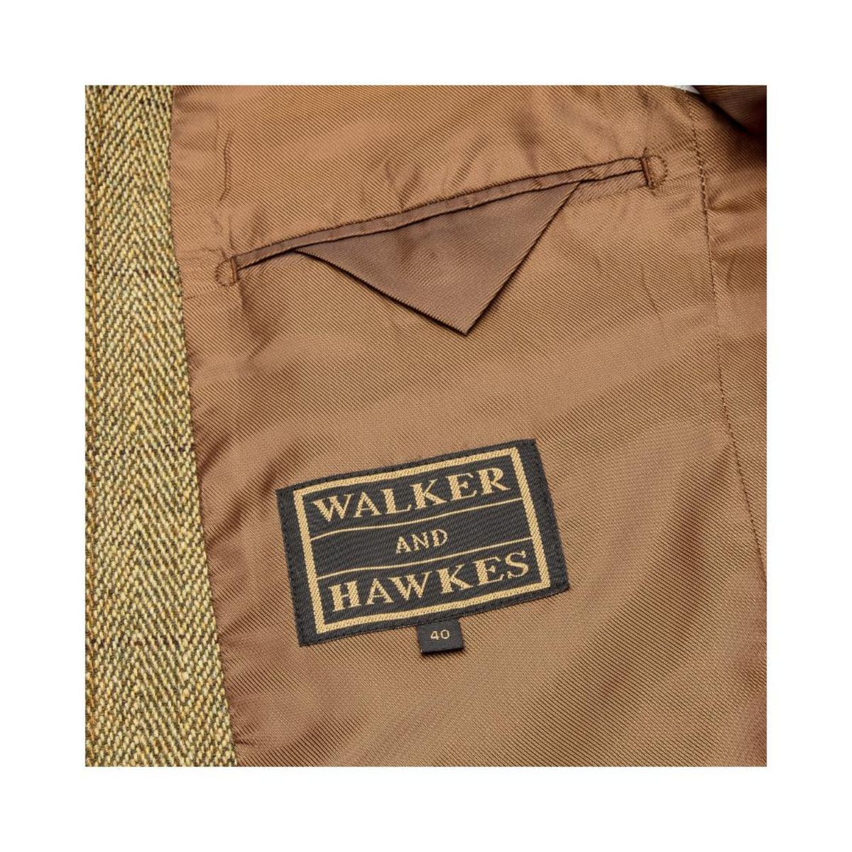 Povitaskun alle on ommeltu Walker&Hawkes -logomerkki.