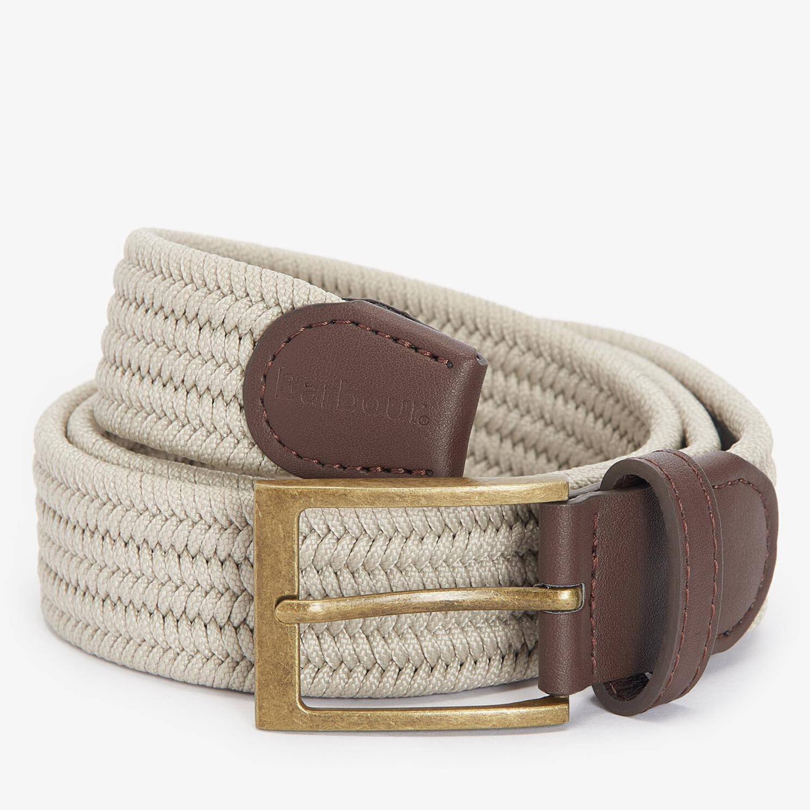 Kuvassa on joustava Barbour Nevis Webbing punosvyö jossa antiikkimessingin värinen solki sekä somisteet nahkajäljitelmää.