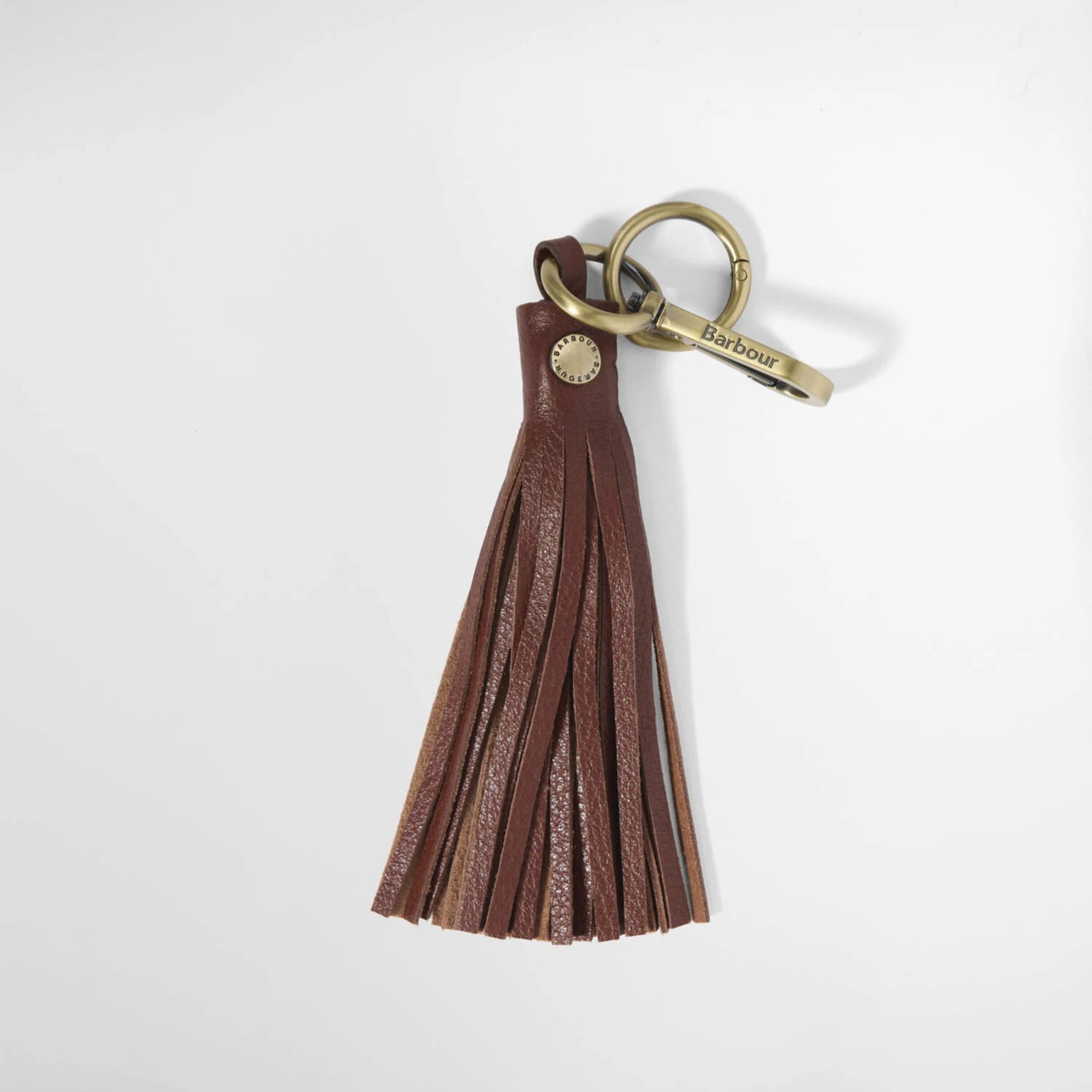 Kuvassa on nahkainen Barbour Tassle Leather Charm jota voi käyttää avaimenperänä tai laukkukoruna.