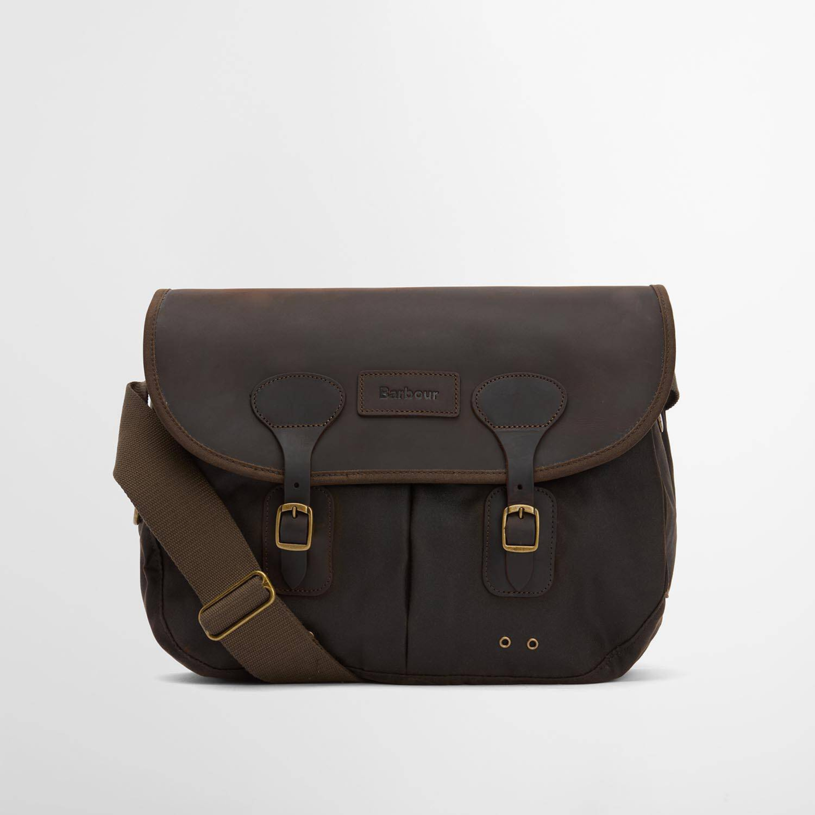 Barbour Waxed Leather Tarras Bag on klassinen ja tilava vahakankaasta valmistettu tilava olkalaukku.