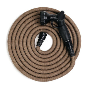 By Benson Hose Deluxe beige puutarhaletku kerällä valkoisella pohjalla.