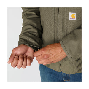 Lähikuva vihreän Carhartt Active Jacketin hihansuusta. Resorireunus.