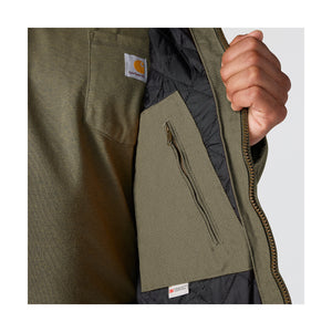 Lähikuva vihreän Carhartt Active Jacket takin povitaskusta.