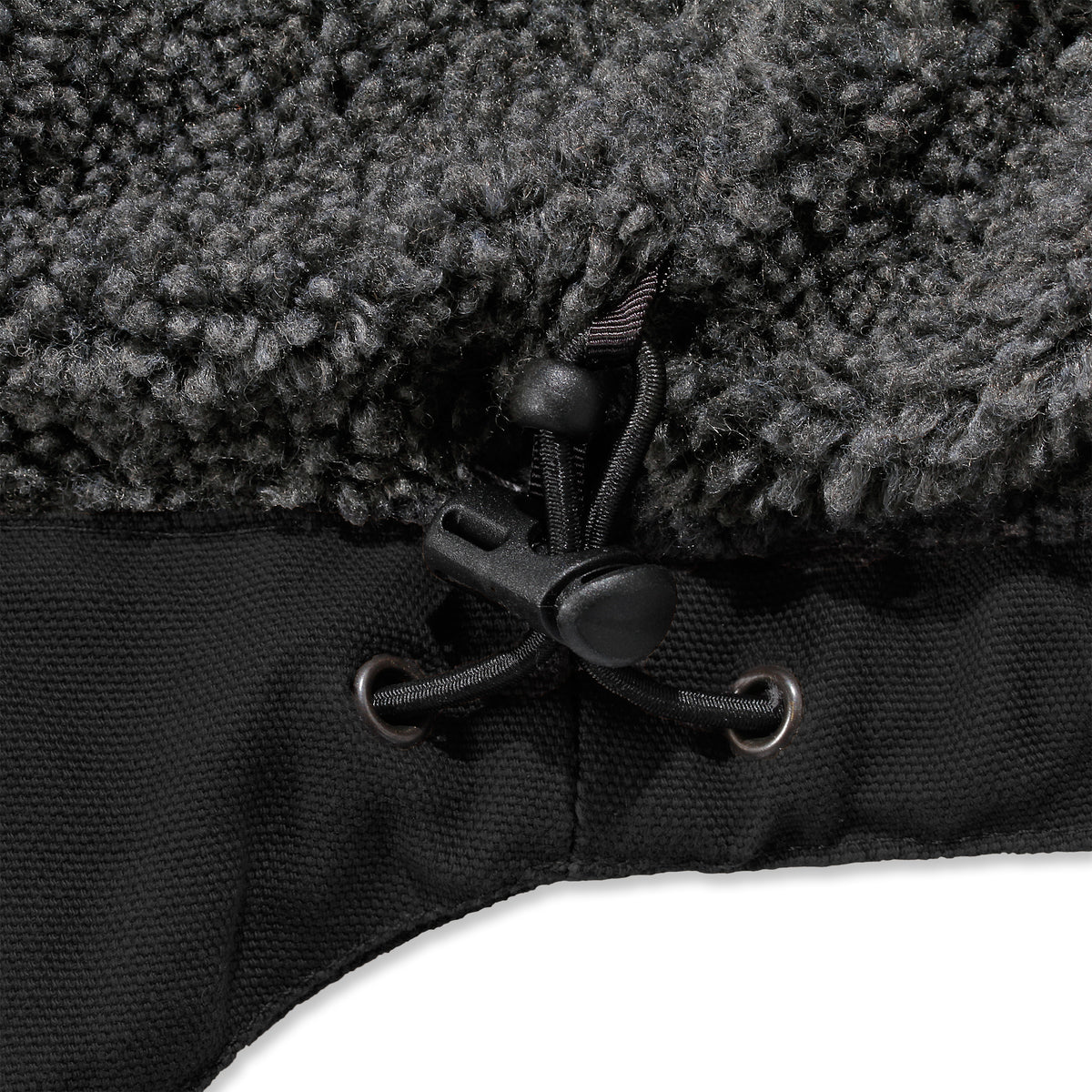 Carhartt Bartlett takin yksityiskohta, jossa näkyy alahelman kiristysnauha.