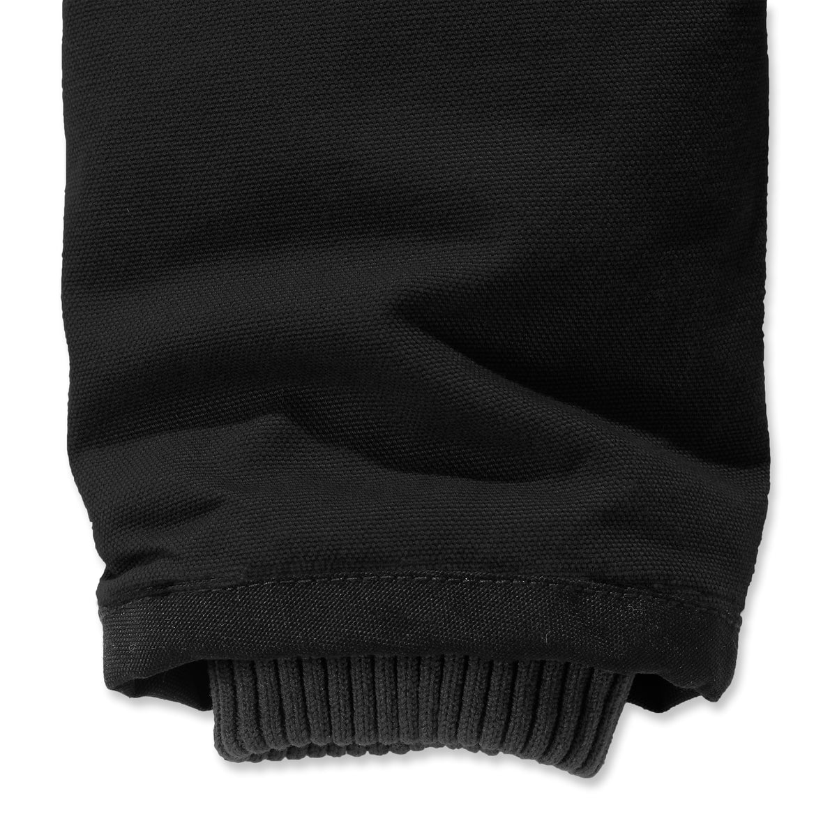 Mustan Carhartt Bartlett takin yksityiskohta, jossa näkyy hihan piiloresori.