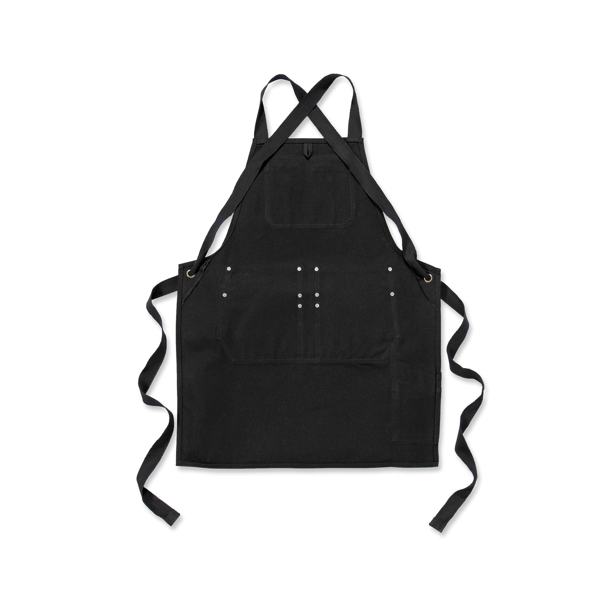 Carharttin musta Duck Canvas esiliina takaa päin kuvattuna valkoisella pohjalla.