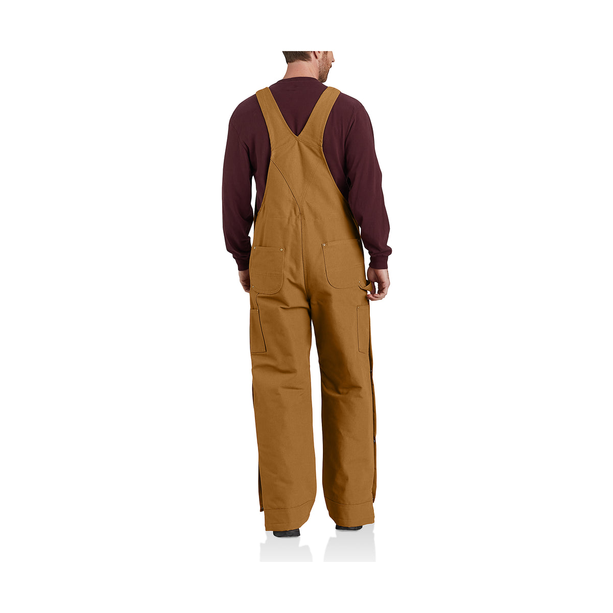 Mallin päällä takaapäin kuvattuna miesten Carhartt Insulated Bib talvilappuhaalarit.