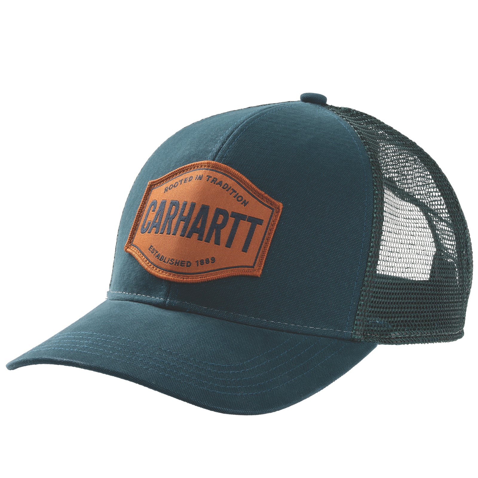 Sinivihreä Carharttin trucker cap, jossa oranssi Carhartt-merkki edessä.