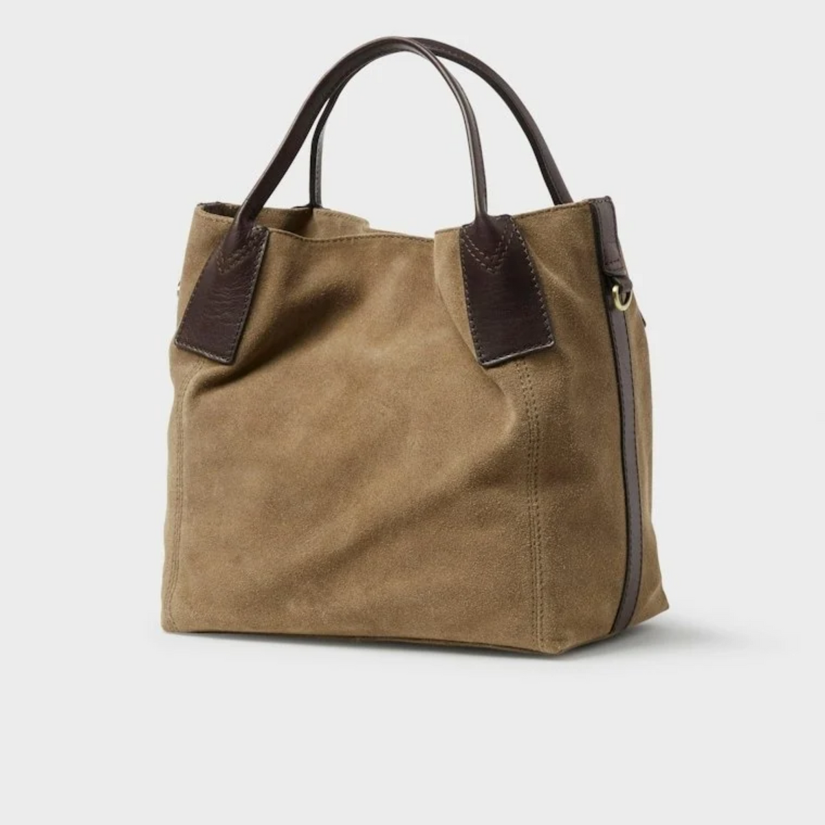 Saddler Inés Mini Tote ruskea mokkanahkainen käsilaukku sivuviistosta, nahkakahvat ja olkahihnan kiinnitysrengas.