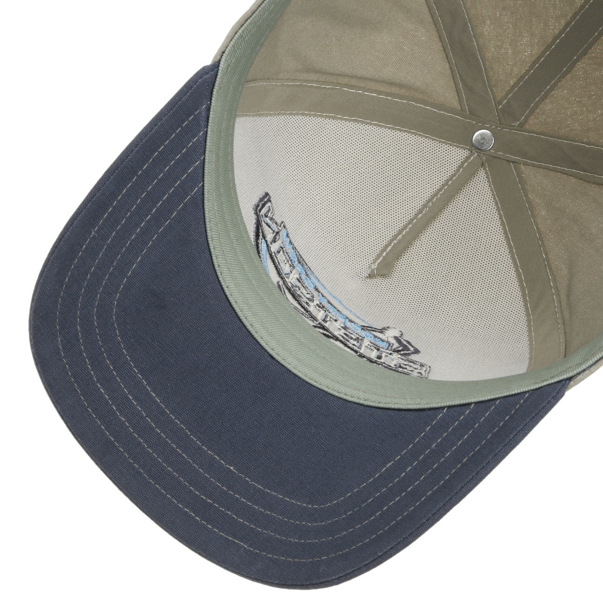 Stetson Trucker Cap Hockey -lippiksen sisäosa, vaalea tukiverkko, vaaleanvihreä hikinauha ja lipan alapuoli.